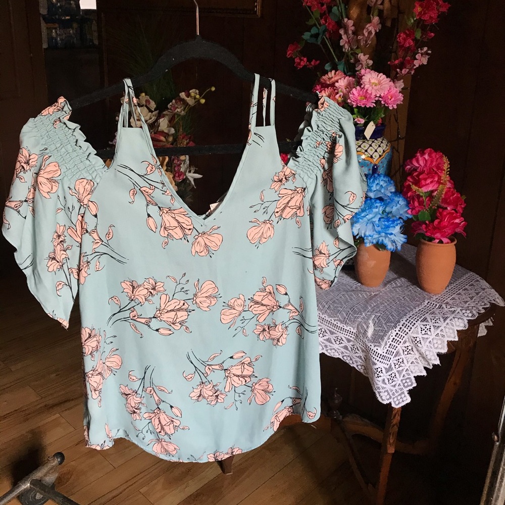 Turquoise floral blouse 🌸